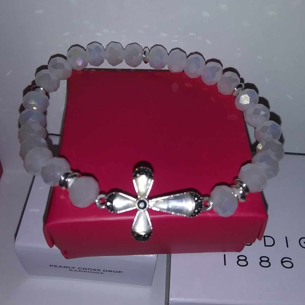 Avon Pearly Cross Bracelet. Fits up to 8inch wrists